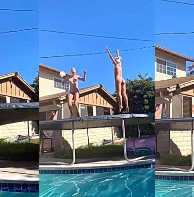 Kendra Sunderland jumping up and down naked on a trampoline
