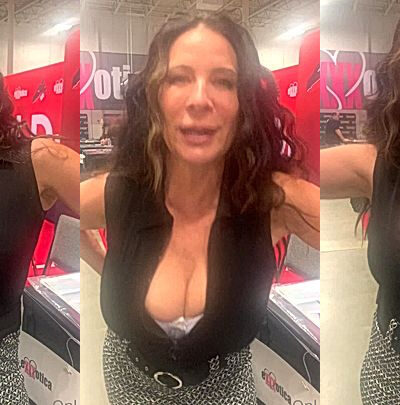 sexy gilf Christy Canyon speaking up during an AVN event