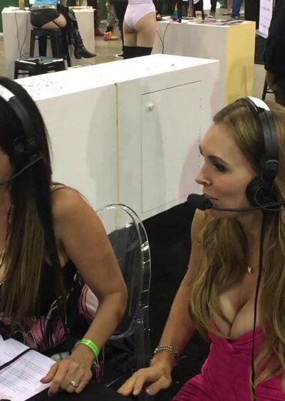 hot milf Christy Canyon commentating during a AVN event