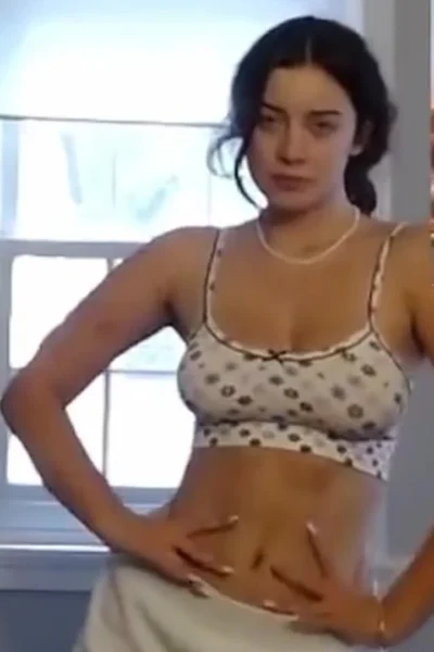 sexy girl hotblockchain teasing her bit tits cleavage while gaming