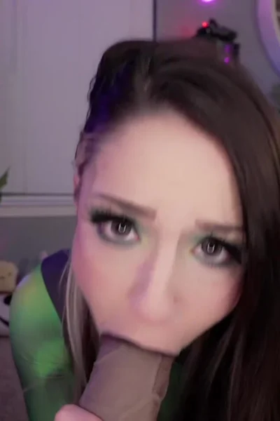 Heatherbby sucking on a massive big black dildo