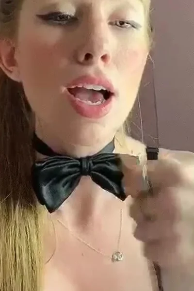 Coconut Kitty riding a dildo in bed