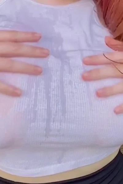 Bishoujomom teasing her naked big tits in her wet see-through top