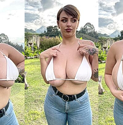 amarettoh teasing her big tits in her jeans outdoors