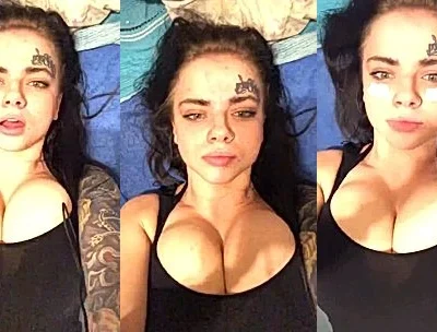 Natalia Polyakova teasing her deep cleavage in bed