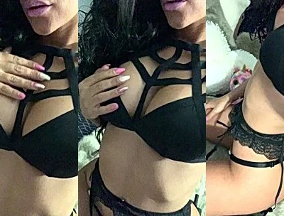 Angela doll flashing her big tits in her black string lingerie