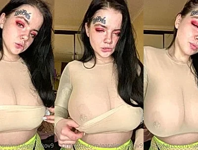 Natalia Polyakova teasing her naked tits in her white see-through top