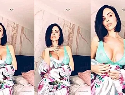 hot British babe Emma Glover teasing her sexy body from her silk robe video leaked