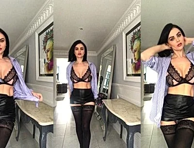 Emma Glover stripping and teasing her black lingerie