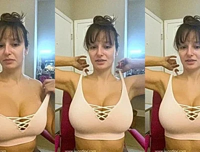 Lexi Luna teasing her big tits in her gym top