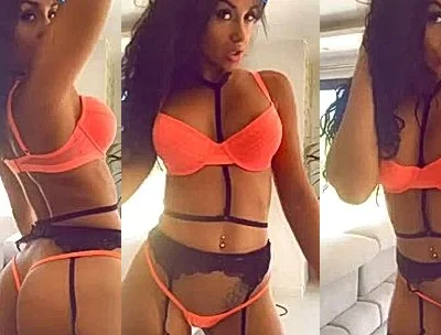 Angela doll teasing her orange sexy lingerie