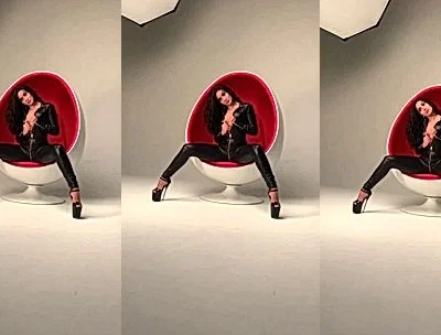 Angela doll teasing her sexy body in her latex bodysuit