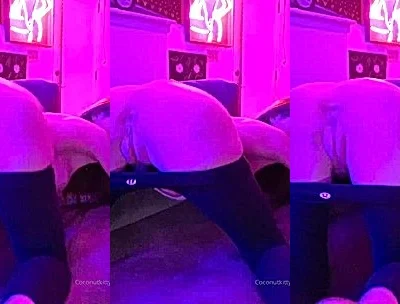 Coconut Kitty teasing her naked big ass in her black stockings