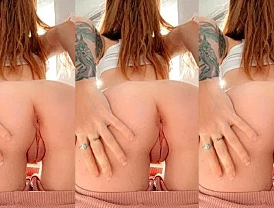 Coconut Kitty teasing her big booty and buttplug
