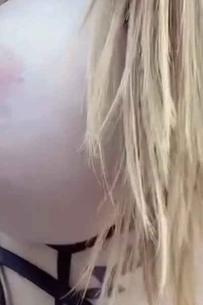 Coconut Kitty playing with her naked big tits