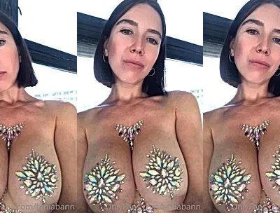 Tania Bann teasing her big tits in her nipple pasties