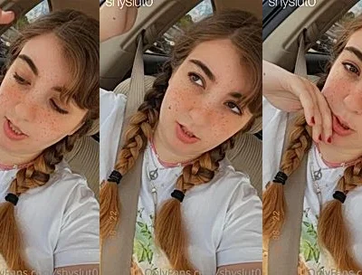 ShySlut0 flashing her tits in the car