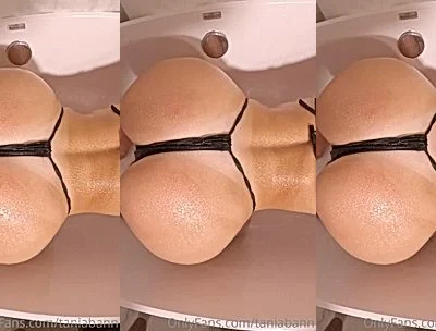 Tania Bann teasing her big ass in the bathtub