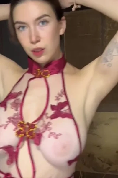 Tania Bann teasing her naked armpits and sexy bodysuit