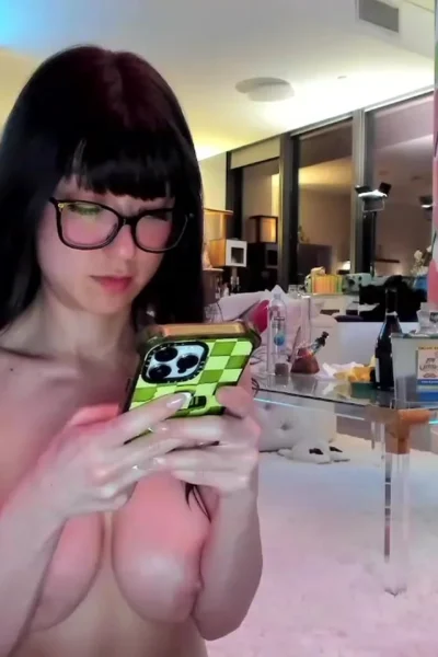 Delightfulhug teasing her naked big boobs on livestream