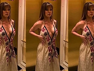 Amanda Cerny showing off her sexy night dress in the mirror
