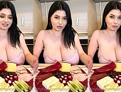 Busty Ema teasing her big boobies in her pink top