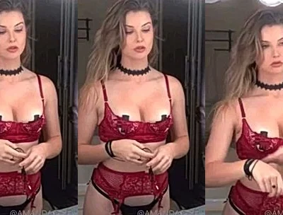 Amanda Cerny teasing her perky tits in her red lingerie