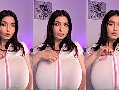 Busty Ema playing with her big boobies in her white see-through shirt