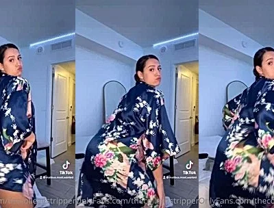 Mia Monroe teasing her naked ass in silk robe