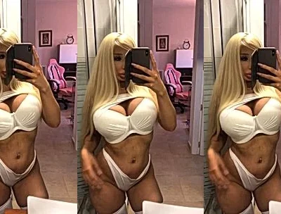 Amanda Toy showing off her big tits in white lingerie