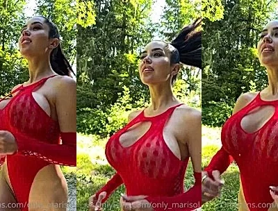 Marisol Yotta teasing her big tits wearing red bodysuit in the forest