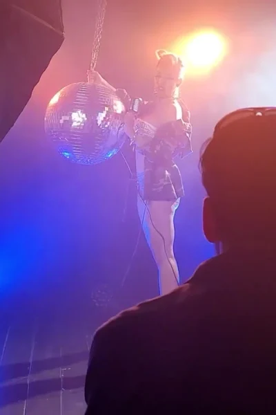 Britney Amber teasing her big tits on stage