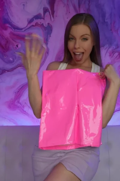 Britney Amber teasing her sexy body in short skirt