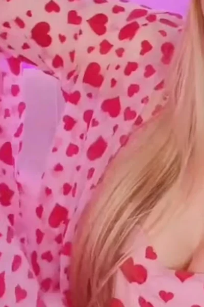 Britney Amber teasing her sexy tits in tight dress