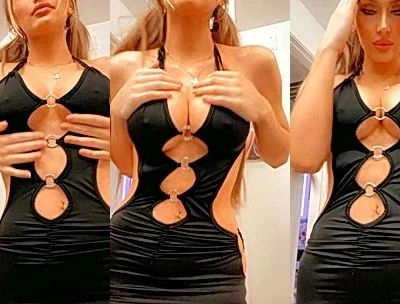 Molly Eskam flashing her big titties in black dress